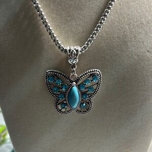 Silver Butterfly Pendant Necklace with Blue Accents